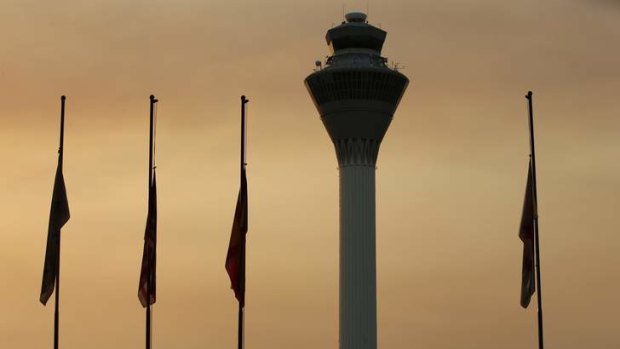 Flags hung at half-mast at the Kuala Lumpur International Airport in Sepang, as a sign of respect for those killed in Malaysia Airlines Flight MH17.
