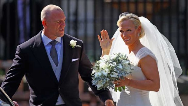 Mike Tindall and Zara Phillips leave after their low-key wedding.