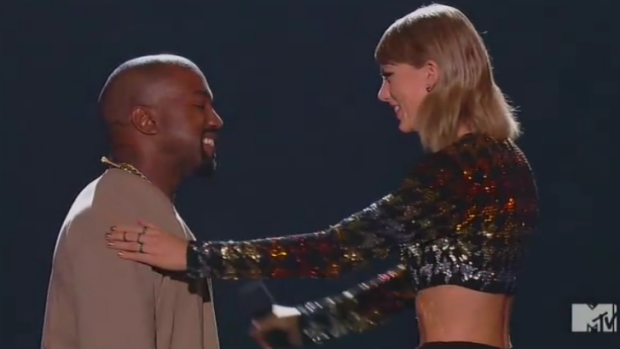 Taylor Swift presented Kanye West with the Video Vanguard award.