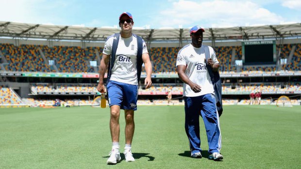 England openers Alastair Cook (left) and Michael Carberry head to the nets  at the Gabba.