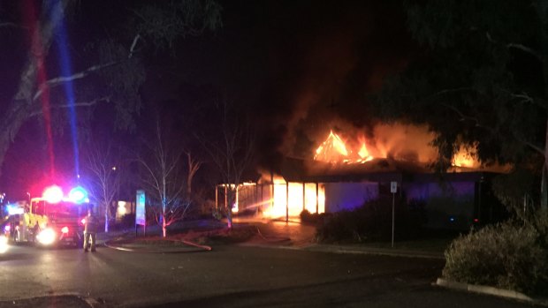 Local Ben Langley saw fire crews tackling the Kambah church blaze at 6:15am while he was out walking his dog.