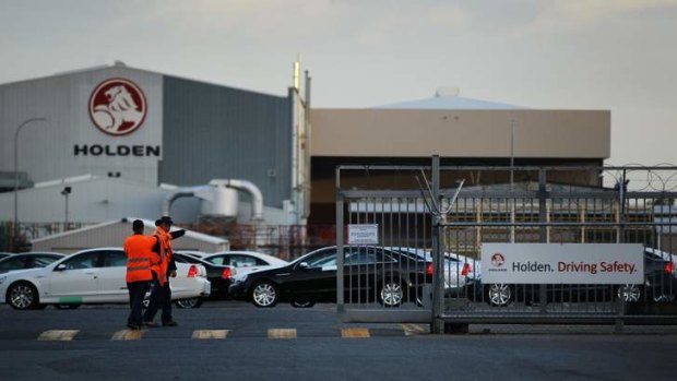 Employees arrive for the 6am shift at the Holden manufacturing plant at Elizabeth in Adeleaide as the company announces it will pull out of manufacturing in Australia by 2017.