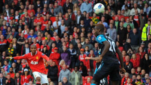 Revenge in mind ... Manchester United's Ashley Young scores the eighth goal against Arsenal.