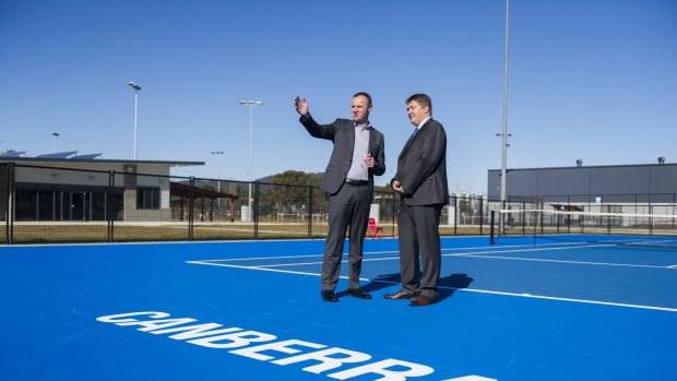 ACT Chief Minister Andrew Barr and Tennis ACT chief executive Ross Triffitt at the redeveloped Canberra Tennis Centre in Lyneham. 
