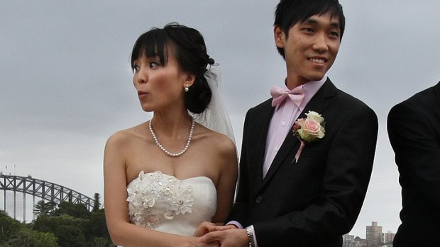 ' We don't think much will change' ... Alicia Zhang and Jonathan Xue, both 28, tie the knot on Sunday.