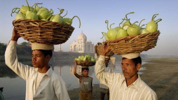 Local sights: Villagers near the  Taj Mahal.