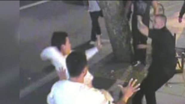 Deadly brawl ... the footage shows Wilson Duque Castillo, foreground, with his hands raised.