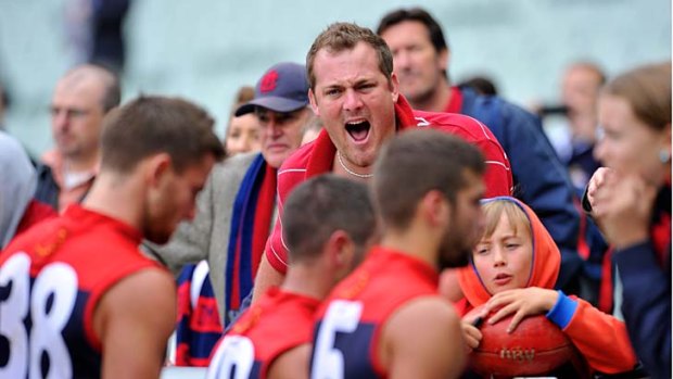 Melbourne fans express their anger at their team's round one capitulation.