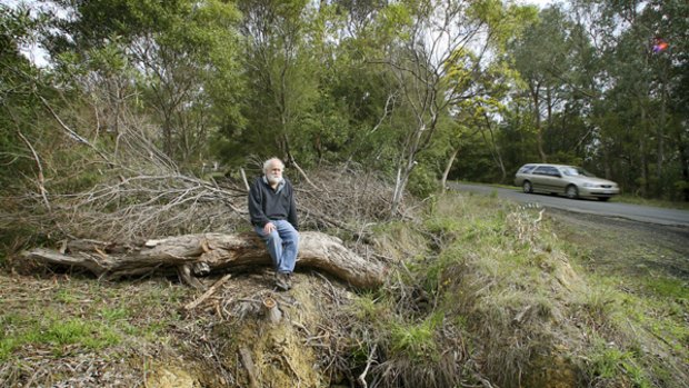 Robert Strickland on the roadside near his home in Healesville.