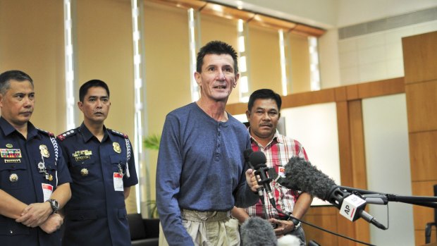 Rodwell addresses the media after his release in 2013.