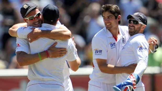 Kevin Pietersen, Andrew Strauss, Alastair Cook and Matt Prior get  up close and personal as they celebrate retaining the Ashes with hugs all round.