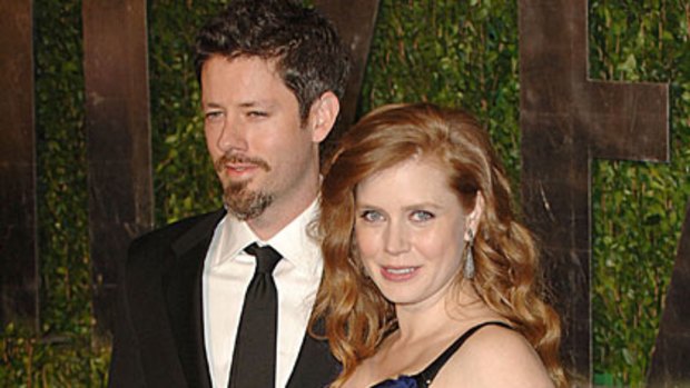New parents ... Amy Adams and Darren Legallo at the Vanity Fair Oscars party in March.