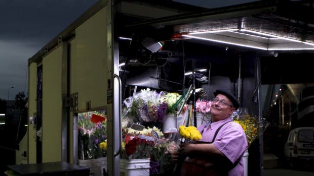Moving with the times ... flower seller Russell Sharp, who drives to business hot spots around Sydney offering produce direct from his van, says he sells three truckloads a week.
