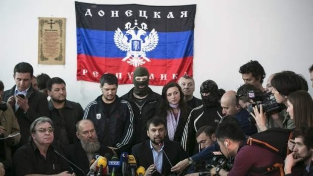 The head of the pro-Russian separatists government Denis Pushilin speaks during a news conference in the regional government building in Donetsk, eastern Ukraine.