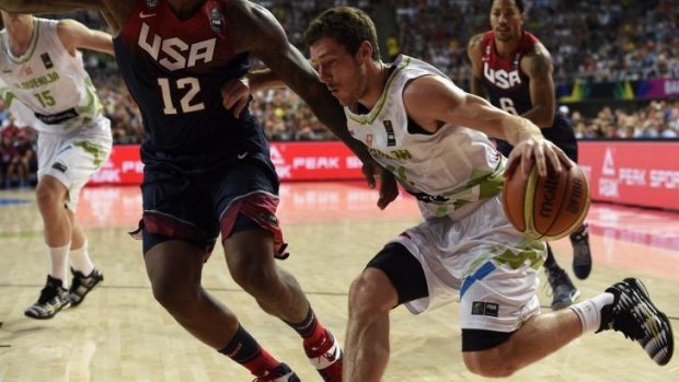 Star performer: Goran Dragic does his best for Slovenia against the USA at the World Cup.