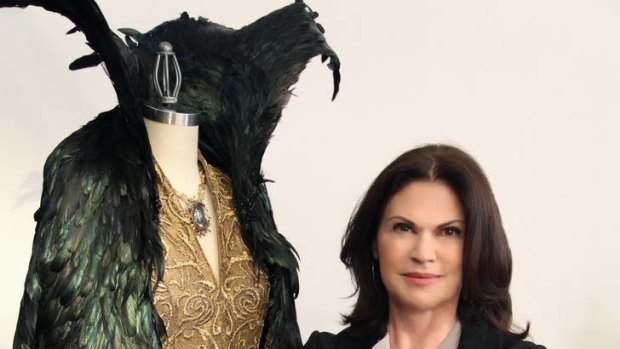 Colleen Atwood's costumes for Queen Ravenna range from light and hopeful to dark and evil, culminating with the extravagant raven cloak.