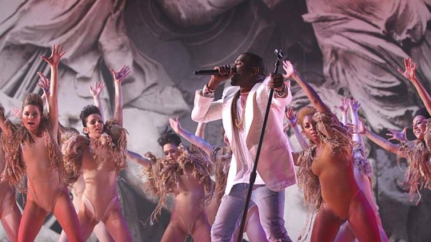 Kanye West and his support dancers thrill the audience at Woodford's Splendour in the Grass music festival.