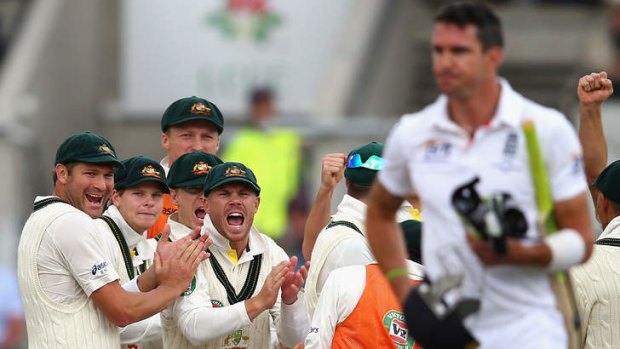 The Australians celebrate after Peter Siddle of Australia claimed the wicket of Kevin Pietersen during day five of third Ashes Test.