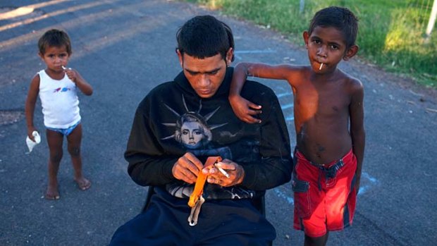 Family and friends from Alice Edwards village prepare to go hunting and fishing for the evening.