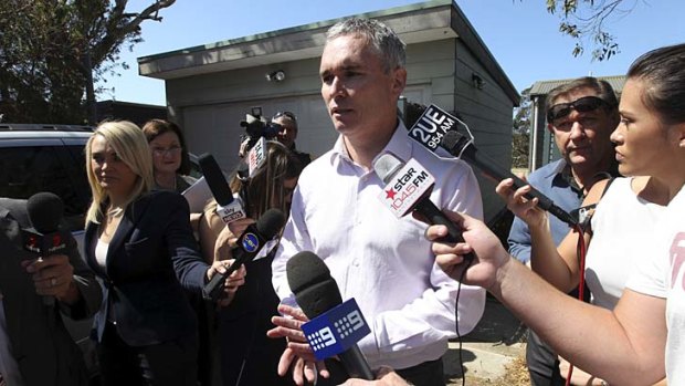 "I will be vindicated"... Craig Thomson outside his home today.