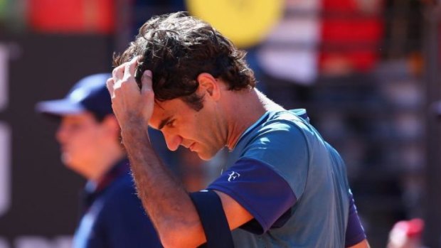 Fed dread: Roger Federer was ousted by French journeyman Jeremy Chardy