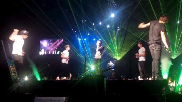 Showmen ... One Direction on stage at their first Australian concert in Adelaide.