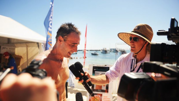 Tim Hewitt, winner of the WAtoday 2011 Rottnest Channel Swim, fronts the media minutes after crossing the finish line.