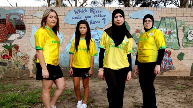 Culture not conflict &#8230; members of the Lakembaroos football team, from left Shaza Rifi, Sue Rifi, Malak Farhat and Zeinab Farhat, can play while wearing a hijab - unlike international counterparts.