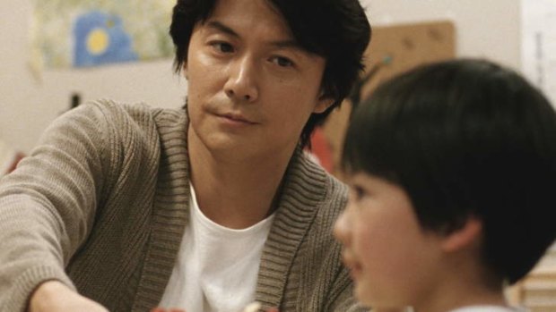 Masaharu Fukuyama as Ryota Nonomiya and Keita Ninomiya as Keita Nonomiya in <i>Like Father, Like Son</i>.
