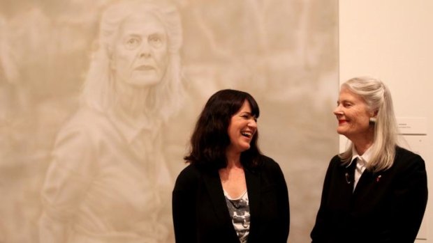 Winner of the 2014 Archibald Prize, Fiona Lowry with her subject, Penelope Seidler, at the NSW Art Gallery in Sydney.