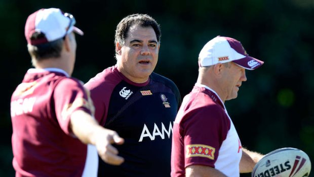 Maroons coach Mal Meninga (centre) has poured cold water over suggestions the Gold Coast could host the State of Origin.