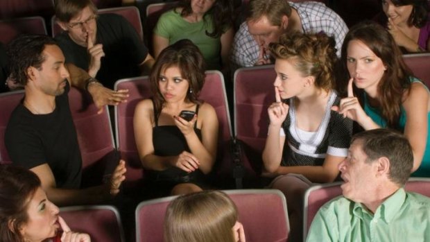 Bad behaviour: Texting has become one of the reasons some people no longer go to movies.