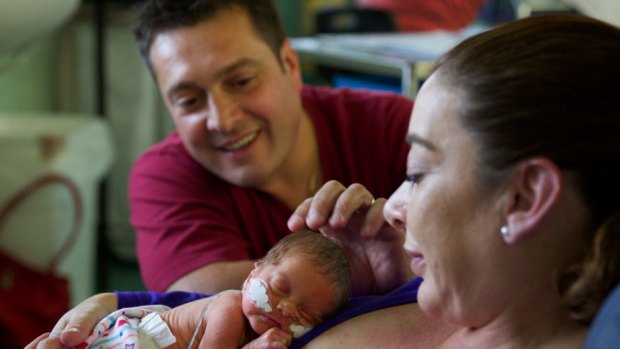 A few days after being born, Lucia is already trying to feed from Cristina, despite being only allowed 20 milligrams, every three hours through a feeding tube.