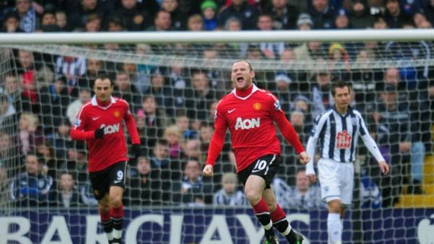 Wayne Rooney celebrates after scoring against West Brom.
