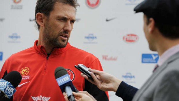Cautious: Tony Popovic is well aware of Kewell's capabilities, having played alongside the striker for the Socceroos.
