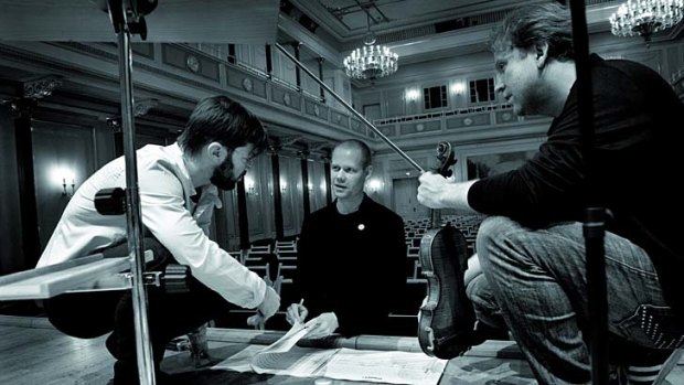 Collaborative spirit ... from left, conductor Andre de Ridder, Max Richter and violinist Daniel Hope.