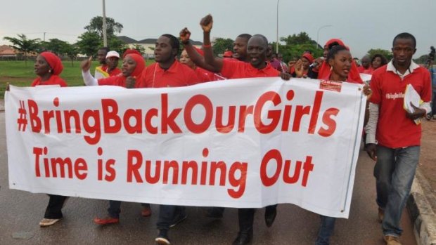 Protesters call on the Nigerian government to rescue the kidnapped girls of the government secondary school in Chibok during a demonstration in Abuja, Nigeria.