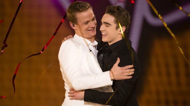 Luke Kennedy, left, embraces Harrison Craig after he's announced the winner of <i>The Voice</i>.