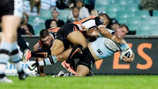 Breaking through: Wade Graham in action against Wests Tigers last year.