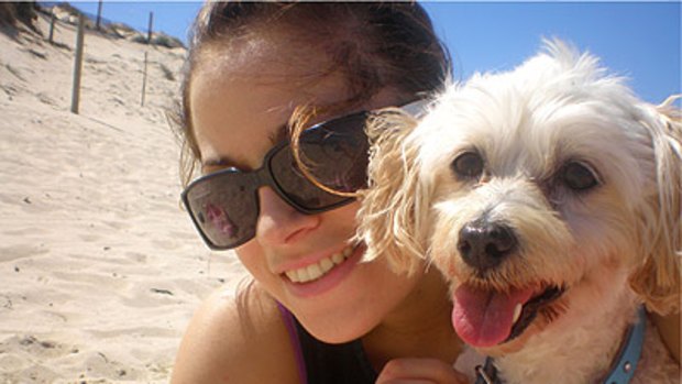 Happier times ... Jennifer Aldridge and her pet dog Honey at Cronulla Beach six weeks before the dog was mauled and killed.