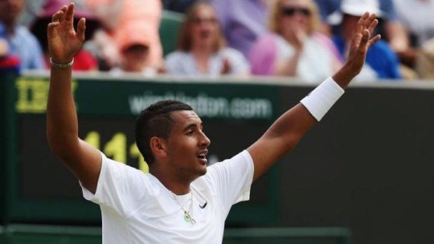 Nick Kyrgios celebrates his five-sets win against Richard Gasquet of France.
