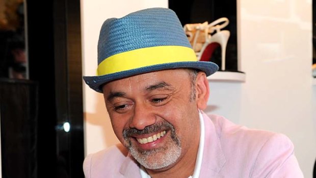 Style statement ... Christian Louboutin at the launch of one of his boutiques.