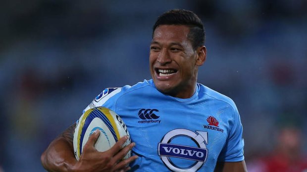 Israel Folau of the Waratahs beats the defence to score a try during the round three Super Rugby match between the Waratahs and the Reds.