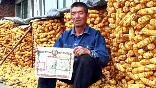 Farmer Wang Gui Shan has certificates proving his family's claim to land, and they may soon prove valuable.