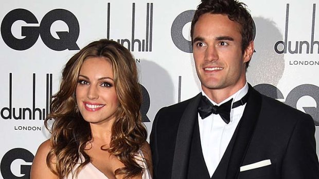 On the way back ... Thom Evans with girlfriend and model Kelly Brook .
