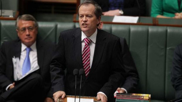 Workplace Relations Minister Bill Shorten responds to questions about the NBN and asbestos during question time on Monday.
