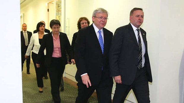 Coming, going: Kevin Rudd and Anthony Albanese depart the leadership battle on Wednesday night.