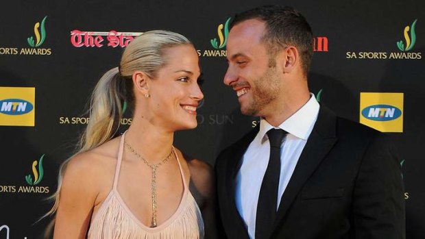 A couple in love: model Reeva Steenkamp and her boyfriend South African "Blade Runner" Oscar Pistorius in Johannesburg in 2012.