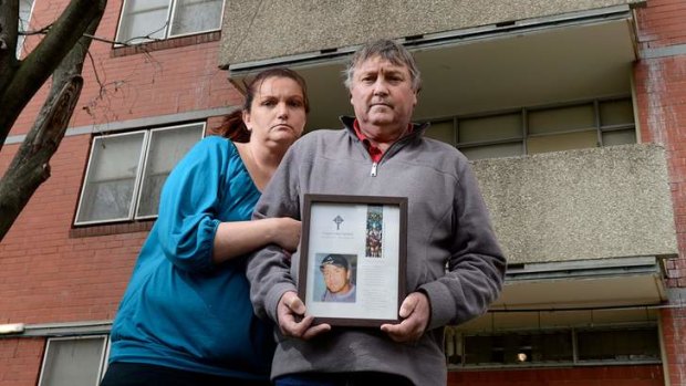 Kylie Mitchell and father John Caulfield at the highrise flats where Gregory fell.
