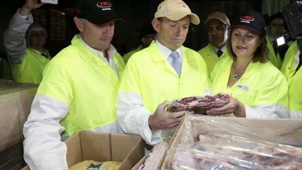 Opposition Leader Tony Abbott on the campaign trail at beef processing plant JBS Australia in Brisbane.